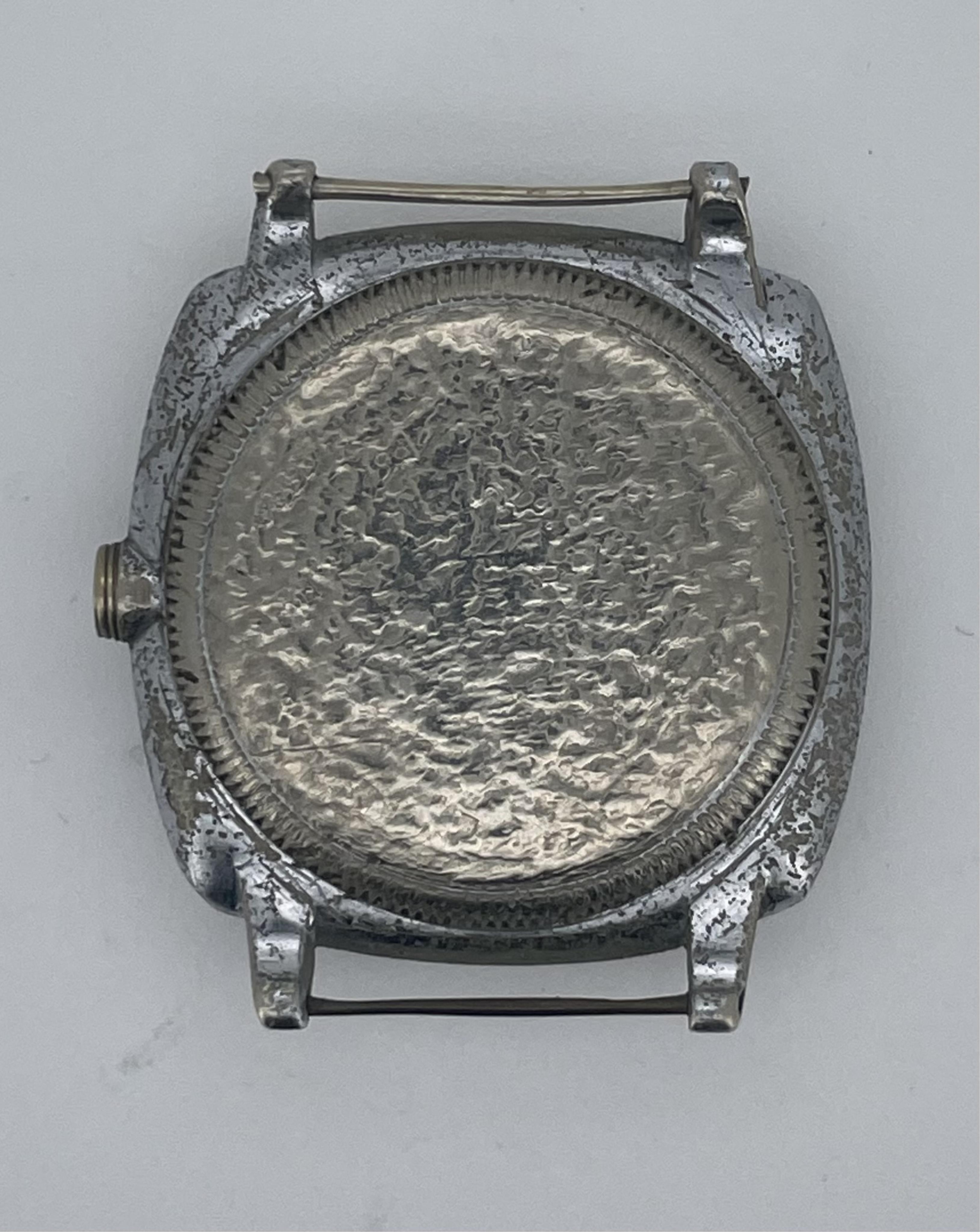 A gentleman’s 1930’s Rolex Oyster Ultra Prima chrome cased manual wind wrist watch, with Arabic dial, subsidiary seconds and cushion case, lacking winding crown and strap, case diameter 30mm.